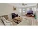 Inviting living room with comfortable seating, modern decor, and a view of the front entrance at 320 Lakeview St # 123, Orlando, FL 32804