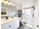 Modern bathroom with white vanity, walk-in shower, and stylish fixtures at 3602 Calabria Ave, Davenport, FL 33897