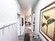 Bright and airy entryway with wood-look tile floors at 3602 Calabria Ave, Davenport, FL 33897