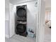 Laundry room with stacked washer and dryer at 3602 Calabria Ave, Davenport, FL 33897