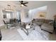 Open concept living room and dining area with modern decor at 3602 Calabria Ave, Davenport, FL 33897