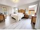 Main bedroom with king-size bed and private access to balcony at 3602 Calabria Ave, Davenport, FL 33897