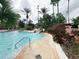 Relaxing pool with a water slide at 3602 Calabria Ave, Davenport, FL 33897