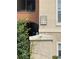 Close-up exterior view of the building with unit number display at 5542 Metrowest Blvd # 206, Orlando, FL 32811