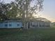 Ranch style home with screened patio and large backyard at 713 Swan Way, Kissimmee, FL 34758
