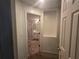 Bathroom with shower, bathtub and updated vanity at 713 Swan Way, Kissimmee, FL 34758