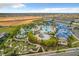 Aerial view of community pool, water park, and amenities at 826 Paradise Dr, Davenport, FL 33897