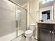 Clean bathroom with a shower and granite vanity at 826 Paradise Dr, Davenport, FL 33897