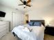 Grey bedroom with a double bed and dresser at 826 Paradise Dr, Davenport, FL 33897