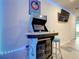 Game room with arcade game and Simpsons decor at 826 Paradise Dr, Davenport, FL 33897