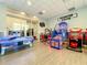 Game room with air hockey, basketball arcade game, and other arcade machines at 826 Paradise Dr, Davenport, FL 33897