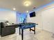 Game room featuring foosball table and LED lighting at 826 Paradise Dr, Davenport, FL 33897