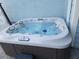 Inviting hot tub with clear water and modern features, perfect for relaxation and unwinding after a long day at 826 Paradise Dr, Davenport, FL 33897