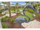 Community mini golf course with flamingo sculpture at 826 Paradise Dr, Davenport, FL 33897