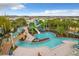 Community water park with slides and a lazy river at 826 Paradise Dr, Davenport, FL 33897