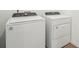 Modern laundry room featuring a new washer and dryer set, ready for immediate use at 1124 Griffon Ave, Lake Alfred, FL 33850