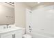 Clean bathroom with a tub and shower combination and a white vanity at 14480 Chinese Elm Dr, Orlando, FL 32828