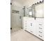 Modern bathroom with glass shower and white vanity at 14480 Chinese Elm Dr, Orlando, FL 32828