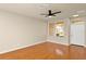 Cozy living room showcases wood floors and natural light, perfect for comfortable living at 14480 Chinese Elm Dr, Orlando, FL 32828