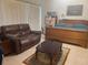 Cozy bedroom with wood furnishings, neutral tones, and natural light at 2355 Abalone Blvd, Orlando, FL 32833