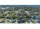 Aerial view showing a residential neighborhood with houses, trees, and streets at 5533 Satel Dr, Orlando, FL 32810