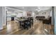 Open concept dining area with hardwood floors and kitchen access at 5533 Satel Dr, Orlando, FL 32810