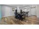 Dining area with hardwood floors and a table for four at 5533 Satel Dr, Orlando, FL 32810