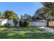 House exterior showcasing a well-kept lawn and attached garage at 5533 Satel Dr, Orlando, FL 32810
