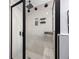 Walk-in shower with built-in bench seating at 5533 Satel Dr, Orlando, FL 32810