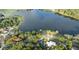 Overhead view of lakefront homes and properties showcasing the neighborhood's waterfront access at 632 Oakhurst St, Altamonte Springs, FL 32701