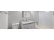 Bathroom featuring a vanity with granite countertops, a square mirror, a toilet, and a shower-tub combo at 632 Oakhurst St, Altamonte Springs, FL 32701