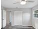 This bedroom features hardwood floors, neutral walls, a closet, and a window offering natural light at 632 Oakhurst St, Altamonte Springs, FL 32701