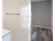 This bedroom features a bathroom connected by a doorway and hardwood floors in both rooms at 632 Oakhurst St, Altamonte Springs, FL 32701
