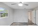 Bedroom features light gray walls, wood-look flooring, a ceiling fan, and a closet for storage at 632 Oakhurst St, Altamonte Springs, FL 32701