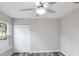 Bedroom features a ceiling fan, closet and large windows for plenty of natural light at 632 Oakhurst St, Altamonte Springs, FL 32701