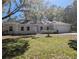 Charming single-story home featuring a well-manicured lawn and an attached two-car garage at 632 Oakhurst St, Altamonte Springs, FL 32701