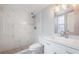 Modern bathroom with white marble shower and updated fixtures at 1000 S Semoran Blvd # 814, Winter Park, FL 32792