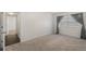 Simple bedroom with carpet flooring and ample natural light at 1000 S Semoran Blvd # 814, Winter Park, FL 32792
