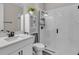 Bright bathroom features a walk-in shower with white subway tile, modern fixtures, and a glass enclosure at 10157 Spring Lake Dr, Clermont, FL 34711