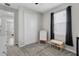 bedroom with art easel, closet, and a large window at 10157 Spring Lake Dr, Clermont, FL 34711