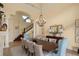 Formal dining room with a large table, chandelier, and hardwood floors at 12540 Park Avenue, Windermere, FL 34786
