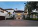 Stunning curb appeal with a grand entrance and brick driveway at 12540 Park Avenue, Windermere, FL 34786