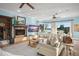 Cozy living room with lake view and comfortable seating at 12540 Park Avenue, Windermere, FL 34786