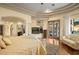 Spacious main bedroom with fireplace and access to patio at 12540 Park Avenue, Windermere, FL 34786
