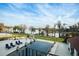 Stunning pool with lake views and lounge chairs at 12540 Park Avenue, Windermere, FL 34786