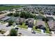 A charming neighborhood boasts neatly kept lawns and sidewalks, with picturesque lake views in the distance at 1727 Wood Path, Auburndale, FL 33823
