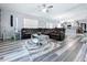 Spacious living room featuring modern floors and an open floor plan at 1727 Wood Path, Auburndale, FL 33823