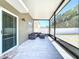 This covered lanai has patio furniture and screens to help keep you cool and comfortable at 1727 Wood Path, Auburndale, FL 33823