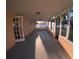 View of the covered patio, featuring access to the backyard with a storage shed at 1859 Lake Hill Cir, Orlando, FL 32818