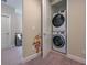 Conveniently placed, stackable washer and dryer inside closet off hallway at 244 Villa Domani Cir, Davenport, FL 33896